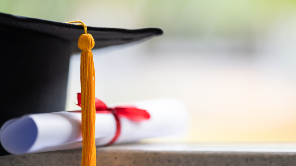 graduation cap and diploma